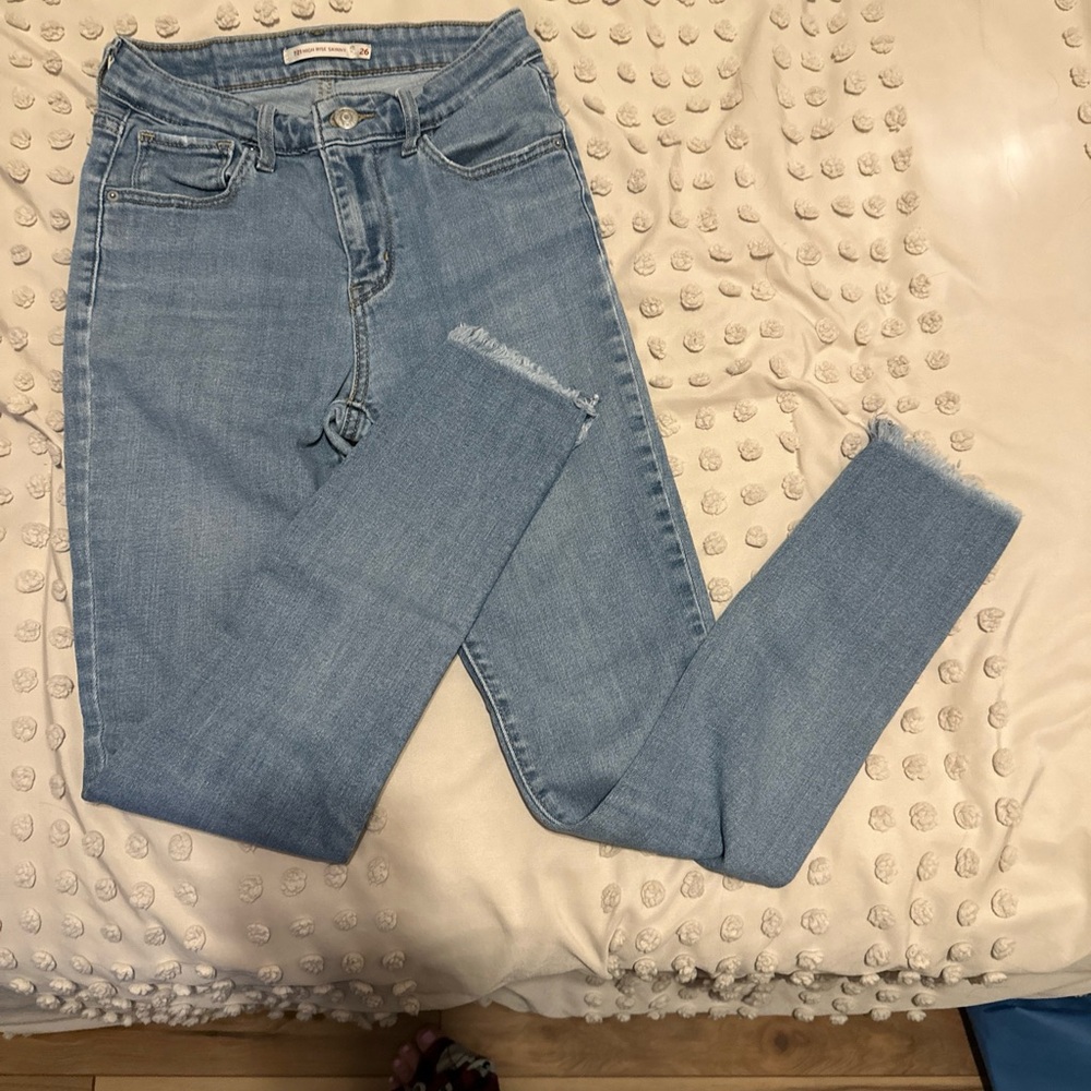 Levi’s distressed ends 721 skinny jeans.